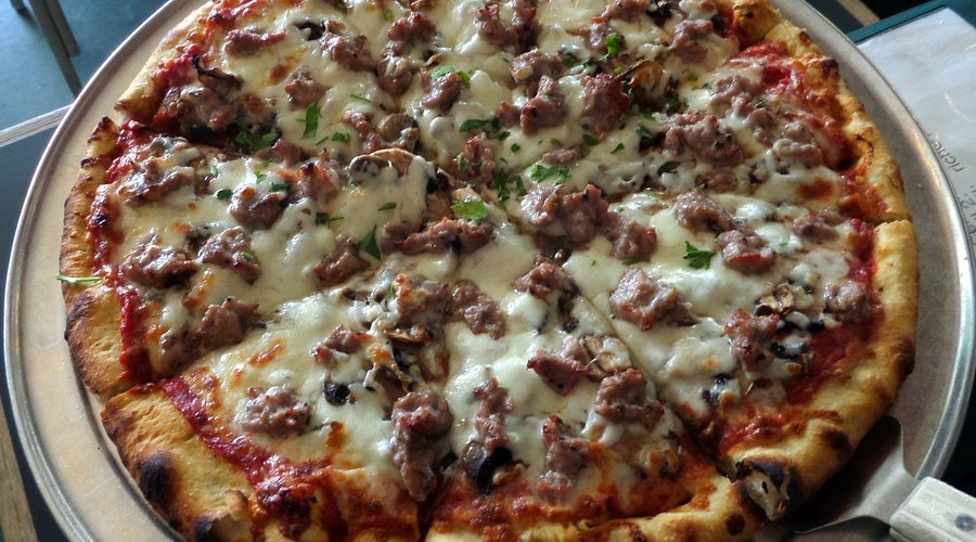 Tony and Alba’s Pizza signature dishes Combination PizzaAll Meat PizzaGarlic Bread